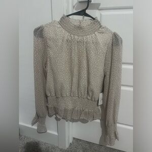 Japna women’s SMALL long sleeve cheetah print blouse.